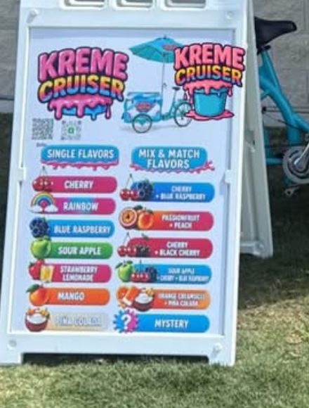 The Kreme Cruiser A frame menu board listing the water ice flavors